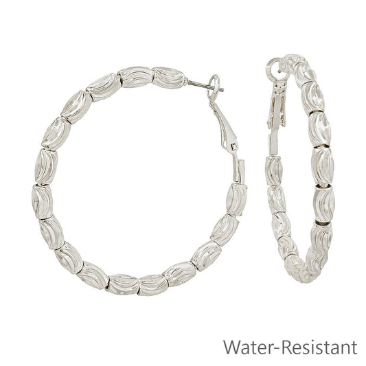 Silver Textured Oval Beads on 2" Hoop Earring