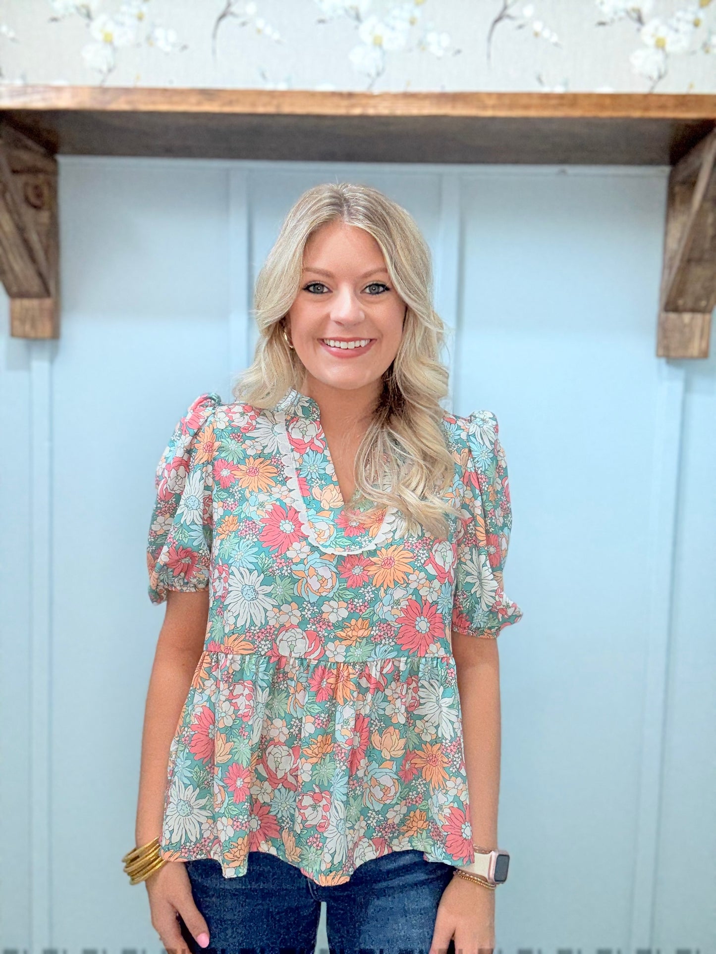Floral Notched Neck Peplum Top